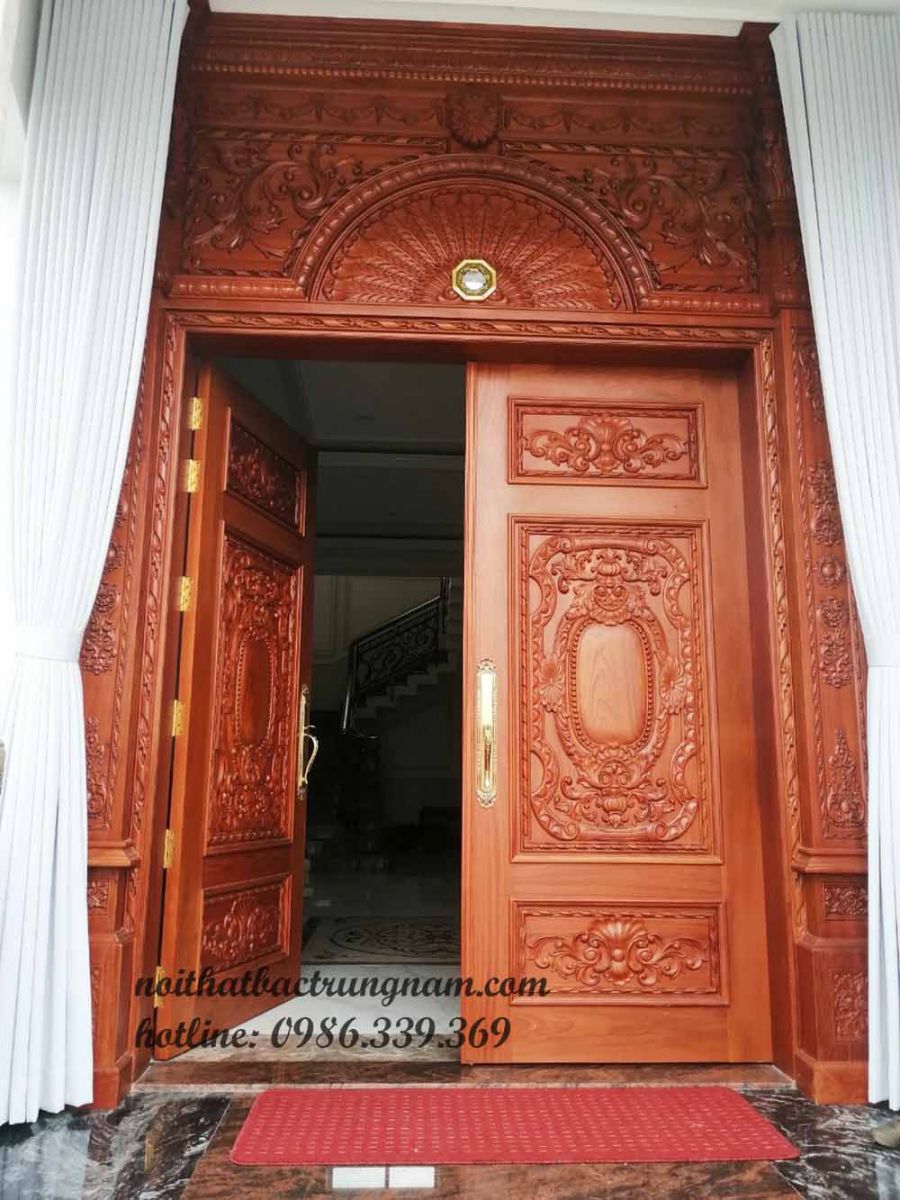 Bộ cửa cổ điển 2 cánh gỗ gõ đỏ nguyên tấm, chạm liền 